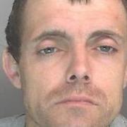 Stephen Neal was barred from several stores in Cambridge city centre, including Sainsbury's, before his arrest