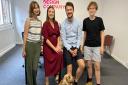 Left to right: Chloe Mann, Holly Finch, Mat Finch and Harri Leith, with Alfie the office dog