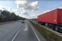 The A14 has one lane closed after a crash involving a car and two lorries