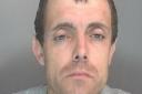 Stephen Neal was barred from several stores in Cambridge city centre, including Sainsbury's, before his arrest