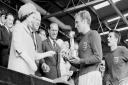 England captain Bobby Moore receives the Jules Rimet Trophy from Queen Elizabeth II after the 1966 World Cup final at Wembley Stadium