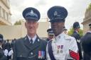 Inspector Matt Snow (L) attended the Queen's funeral on September 19, representing Cambridgeshire Constabulary. He's pictured with an officer from Montserrat.