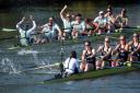 Cambridge University celebrate winning the 75th Women's Boat Race on the River Great Ouse at Littleport.