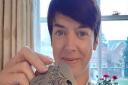 Three Counties Running Club member Zoe Gourley with her virtual run medal.
