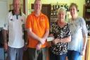 Whittlesey Manor Bowls Club marked the opening of their green for the new season by presenting a £760 cheque to Magpas.