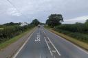 A motorcyclist has died following a crash that involved two cars on the A142.