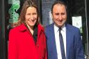 Anil Sharma (right) with Lucy Frazer MP outside Haddenham Pharmacy on Station Road. Picture: SUPPLIED