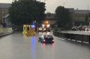 Several crashes took place in Cambridgeshire on October 20, but it is unclear if they were linked to a yellow thunderstorm warning issued by the Met Office that morning. Pictured: flooding in Cambridgeshire in July 2021.