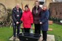 Members of Benwick Street Pride in Bloom were gifted a litter picking trolley to mark the group's 10-year anniversary.
