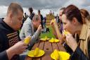 Adults taking part in the last sweetcorn eating competition at Skylark.