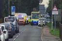Police and ambulance crews at the scene of the crash in Oilmills Road, Pondersbridge