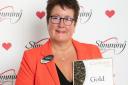 Dawn Breacher with her 'gold' Slimming World award on Celebration Day 2023