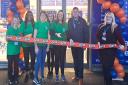 Chatteris Foodbank volunteers cut the ribbon at the new B&M store in Chatteris