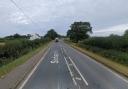 A motorcyclist has died following a crash that involved two cars on the A142.