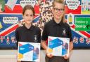 Ophelia Finlay and Abigail Jones from Isleham have been named the East of England regional winners in an annual contest designed to bring awareness to the range of roles within the NHS. They are pictured holding their certificates
