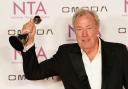 Jeremy Clarkson poses with his award in the press room during the National Television Awards (Ian West/PA)