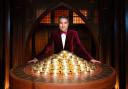 The comedian will host the stage show at the Gillian Lynne Theatre (Euan Cherry/PA)