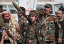 Yemen’s Houthi rebels march during a mobilisation campaign in Sanaa (AP)