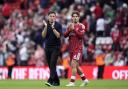 Liverpool manager Andoni Iraola and Milos Kerkez applaud the Liverpool fans (Peter Byrne/PA)