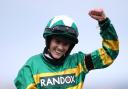 Rachael Blackmore celebrates on Minella Times after winning the 2021 Randox Grand National during Grand National Day of the 2021 Randox Health Grand National Festival at Aintree Racecourse, Liverpool. Picture date: Saturday April 10, 2021.