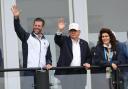 US President Donald Trump with his son Eric Trump waving to spectators at the Irish Open at the Trump International Golf Links & Hotel in Doonbeg, Co Clare (Damien Eagers/PA)