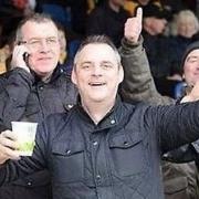 Simon Dobbin, before he was injured, at a Cambridge United match Picture: FAMILY PHOTO