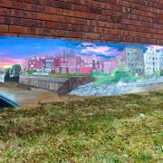 David Housden began painting a part of Wisbech town centre before it was hit by flooding in 1978, and now he has finished the artwork which stretches 16 feet in length.