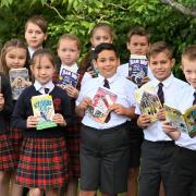 Students at Peckover Primary School in Wisbech with their new books thanks to the seventh year of MP Steve Barclay's annual Read to Succeed campaign.