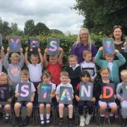 Marshland St. James Primary and Nursery School Staff and pupils celebrate the school’s early years department being rated as outstanding by Ofsted.