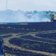Firefighters from Cottenham and other parts of Cambridgeshire tackled a 45-acre field fire near Little Downham, which one resident's home narrowly missed.