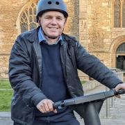 Hard hat time? Mayor Dr Nik Johnson on a visit to Peterborough trying out - for the first time- an E bike