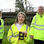 Baroness Vere (left) and Stephen Barclay MP (right) with Ava McCulloch, 13, who suggested renaming the Nene Bridge after the Tiddy Mun