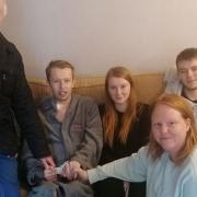 Jordan Simon (second from left), who has died aged 25, with his family