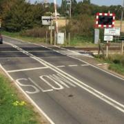 New red light safety equipment plans are being proposed for the railway crossing on Ramsey Road in Whittlesey.