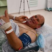 Mark Hudson recovering from his pioneering heart treatment at the Royal Papworth Hospital
