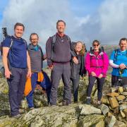 Cambridge Meridian Academies Trust (CMAT) staff after completing the Lake District 10 Peaks challenge in 10 hours.