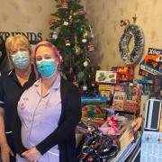 Hayley Massey and Carole Wood with Emma Watts and Mark Southwood from Barnados who collected the gifts.