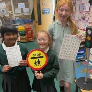 Year 5 children who led an assembly and organised a walk to school week poetry writing competition.