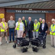 Wisbech St Mary Street Pride group receive new trollies. Front, from left: chairman Sarah Bligh, Cambridgeshire and Peterborough Police and Crime Commissioner Darryl Preston, Fenland District Council’s portfolio holder for environment Cllr Peter
