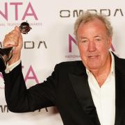 Jeremy Clarkson poses with his award in the press room during the National Television Awards (Ian West/PA)