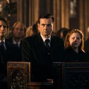 Tennant looks heartbroken in a church pew in a first look image at the second half of season two of Rvals which resumes on November 11 (Disney+)