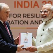 Russian President Vladimir Putin, left, and Indian Prime Minister Narendra Modi met on the sidelines of the summit (Alexander Kazakov, Sputnik, Kremlin Pool/AP)