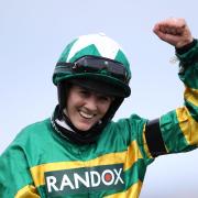 Rachael Blackmore celebrates on Minella Times after winning the 2021 Randox Grand National during Grand National Day of the 2021 Randox Health Grand National Festival at Aintree Racecourse, Liverpool. Picture date: Saturday April 10, 2021.