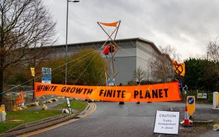Peterborough’s Amazon is closed as Police and XR (Extinction Rebellion) close roads and access to the distribution centre. Stanground, Peterborough Friday 26 November 2021